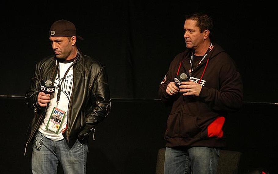 Ultimate Fighting Championship event commentators Joe Rogan, left, and Mike Goldberg take fans' questions during a question-and-answer session at the UFC Fan Expo on Oct. 15 in London.