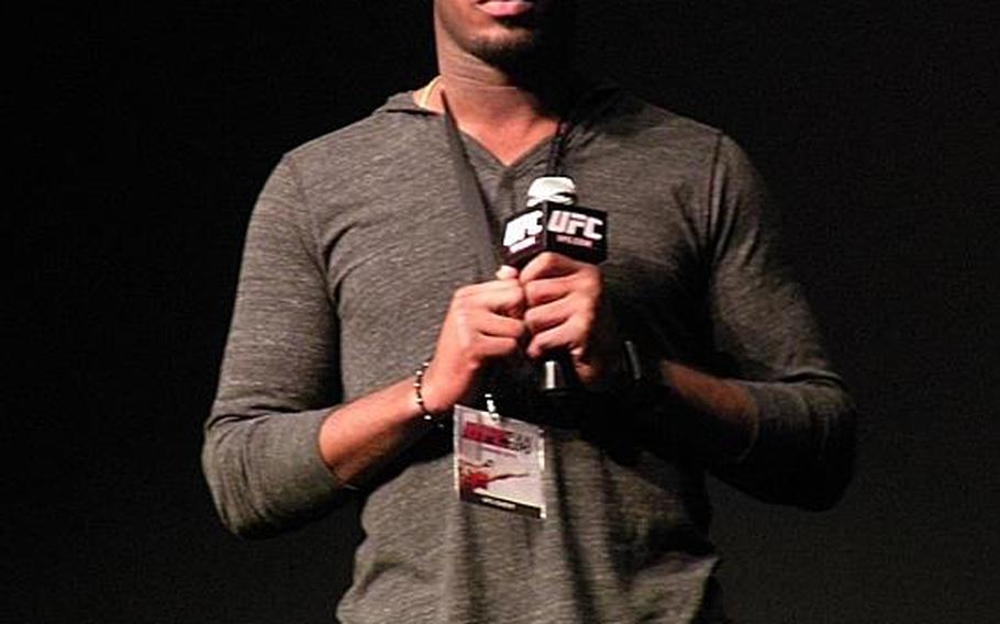 An American newcomer to mixed martial arts fighting, Jon ''Bones'' Jones, answers fans' questions at the first Ultimate Fighting Championship Fan Expo held in Britain, Oct. 15-16. Jones is only 23 years old, stands 6-foot-4 and has an 84.5-inch reach.