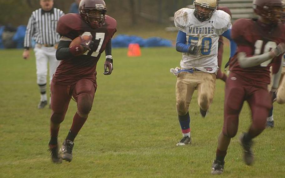 Vilseck senior Kayln Smithson charges up field Saturday in the Falcons' 28-21 loss to visiting Wiesbaden. Smithson rushed for 149 yards on 22 carries and scored a touchdown for the Falcons.