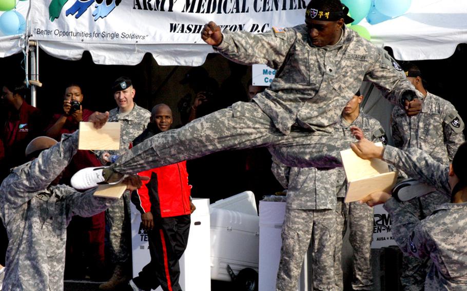 A Tae Kwan Do demonstration by troops from the 2nd Infantry Division in South Korea was one of the many post-race attractions in the Pentagon parking lot.