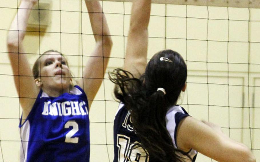 Karoline Heiberg, right, of International School of the Sacred Heart and Rachael Wilson of Christian Academy Japan go up for the ball during Tuesday's Kanto Plain Association of Secondary Schools girls volleyball match at University of Sacred Heart gymnasium, Tokyo. CAJ won 20-25, 25-15, 25-18, 25-17.
Noguchi is one of 111 students attending this week's DODDS-Pacific Far East High School Journalism Conference in Tokyo; this photo was taken at the conference's annual sports writing and photography challenge.