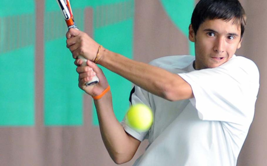 Top-seeded Ajdin Tahirovic of Patch returns a shot to Heidelberg's James Chase in their quarterfinal match at the DODDS-Europe tennis finals in Wiesbaden, Germany, on Friday. Tahirovic beat the eighth-seeded Chase 6-0, 6-1.