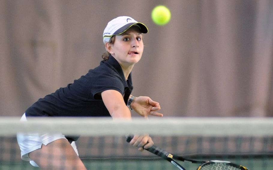 Top-seeded Ginevra Bolla returns a shot at the net in her quarterfinal match against Ramstein's Michaela Corral at the DODDS-Europe tennis finals in Wiesbaden, Germany, on Friday. Bolla won 6-1, 7-5.