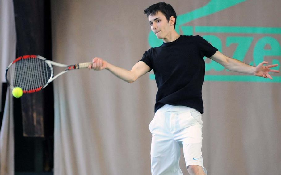 SHAPE's Nickolay Gospodinov returns a shot from AOSR's Gabriele Boccaccini in his 7-6 (8-6), 6-2 quarterfinal win at the DODDS-Europe tennis finals in Wiesbaden, Germany, on Friday.