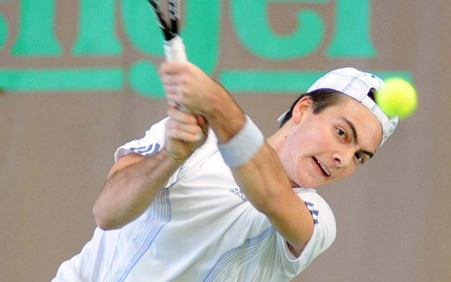 AOSRs Gabriele Boccaccini slams back a shot from SHAPE's Nickolay Gospodinov at the DODDS-Europe tennis finals in Wiesbaden, Germany, on Friday. Unseeded Boccaccini lost the quarterfinal match to the third seed, 6-7 (6-8), 2-6.