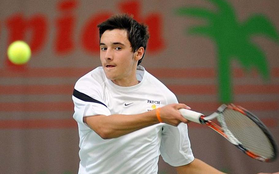 Patch's Ajdin Tahirovic slams back a Cameron Meeker shot in a boys semifinal match at the DODDS-Europe tennis championships in Wiesbaden, Germany, on Friday. The top-seeded Tahirovic  advanced to Saturday's final with a 6-4, 6-4 win over Meeker, the tourney's fifth seed.