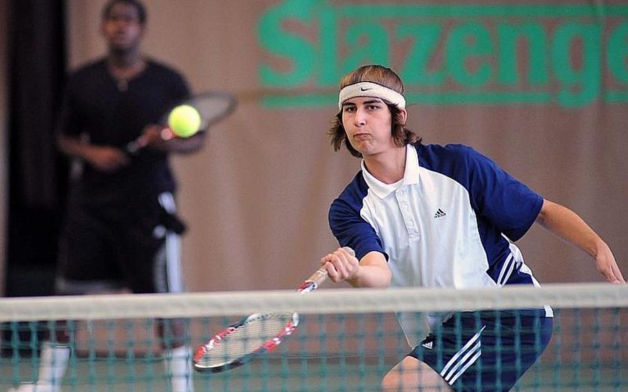 Heidelberg's Jack Kolodziejski returns a shot in Friday's boys doubles semifinal as teammate Darien Ward watches. The top-seeded team advanced to Saturday's final with a 6-4, 4-6, 6-3 win over Arman and Evin Alarilla of Wiesbaden.