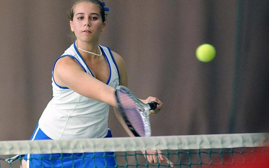 Ramstein's Olivia Rockwell returns a shot in a girls doubles semifinal at the DODDS-Europe tennis championships in Wiesbaden, Germany, on Friday. Rockwell and Meghan Augsburger, the defending champions, will defend their title Saturday after beating Yu Murakami and Ana Torrijos of International School of Brussels in the semis.