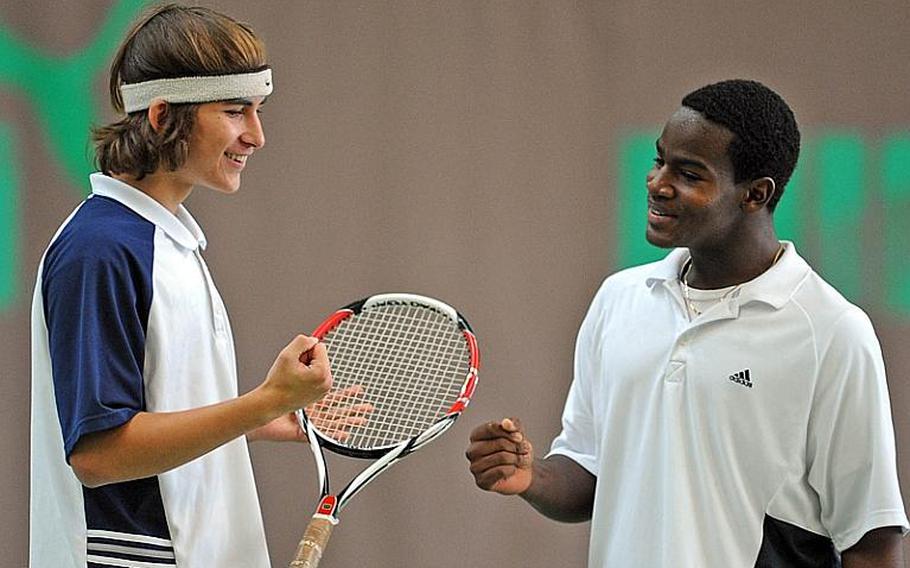 Top-seeded Jack Kolodziejski, left, and Darien Ward of Heidelberg celebrate winning the boys doubles title at the DODDS-Europe tennis championships in Wiesbaden, Germay, on Saturday. The pair defeated Alvaro Sanchez and Aaron Yip of SHAPE 6-4, 7-5.