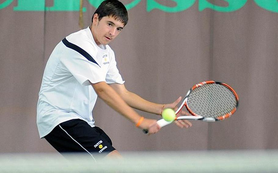 Patch's Ajdin Tahirovic keeps his eyes on the ball as he prepares to return a shot to Patrick Tan of ISB in the boys single final at the DODDS-Europe tennis championships in Wiesbaden, Germay, on Saturday. Top-seeded Tahirovic won 6-1, 6-2 over Tan, the tourney's second seed.