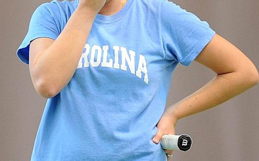 Heidelberg's Paige Chase tries to hold back tears of joy after defeating top-seeded, two-time defending champion Ginevra Bolla of Marymount 6-2, 6-4, to take the girls single title at the DODDS-Europe tennis championships in Wiesbaden, Germay, on Saturday.