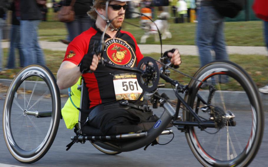 Hand cycle athlete Andrew Kinard moves toward a 20th-place finish.