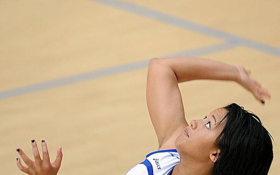 Wiesbaden's LeAmber Thomas serves during a match against Bitburg on Oct. 9. The senior team leader is hoping this is the year she can help bring a Division I volleyball title to the Lady Warriors.