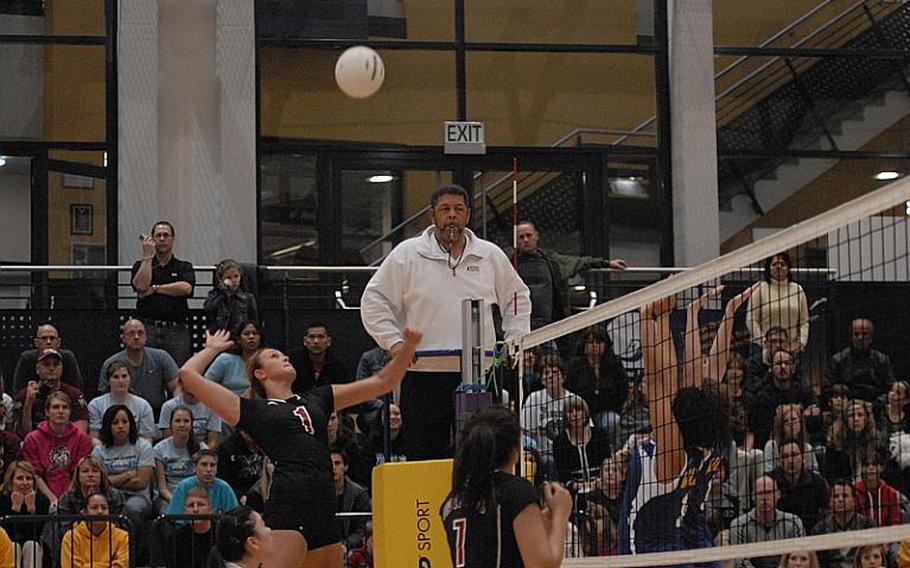 Vilseck senior Anna Muzzy lines up a shot against Wiesbaden in the Division I girls volleyball championship Saturday at Ramstein Air Base.  Vilseck defeated the Warriors to take the title in three straight sets.