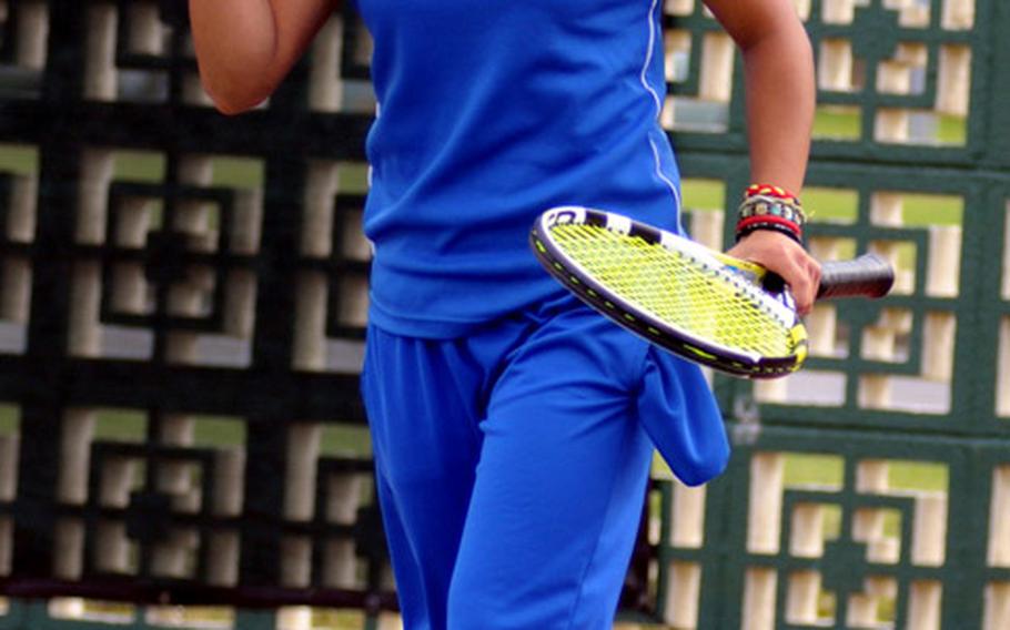 Yokota Panthers junior Erika Ettl exults after winning a point against Kadena Panthers sophomore and former Yokota teammate Erika Youngdahl during Wednesday's  girls singles semifinal match in the Far East High School Tennis Tournament at Risner Tennis Complex, Kadena Air Base, Okinawa. Ettl won 6-2, 6-4.