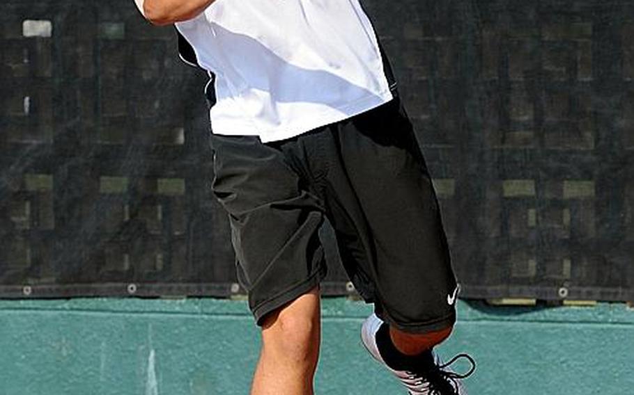 Kadena junior Arlo Taylor prepares to blast a backhand return to St. Mary's International freshman Kent Sikama during Thursday's boys singles championship in the Far East High School Tennis Tournament at Risner Tennis Complex, Kadena Air Base, Okinawa. Sikama rallied from down 0-4 in the third set to beat Taylor 6-2, 5-7, 7-6 (7-5).