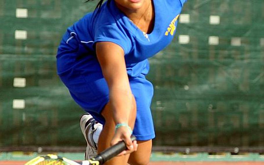 Yokota junior Erika Ettl lunges for a forehand groundstroke against Guam High senior Amber Gadsden during Thursday's girls singles championship in the Far East High School Tennis Tournament at Risner Tennis Complex, Kadena Air Base, Okinawa. Gadsden rallied from behind 3-5 in the first set to overtake Ettl 7-6 (7-4), 6-2.
