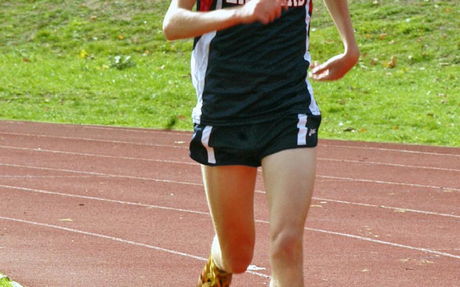 Archie Robertson crosses the finish line ahead of the field in the first 2010 cross country meet of the year. Robertson finished the season by winning the DODDS European championship and being named Stars and Stripes' boys cross country runner of the year.