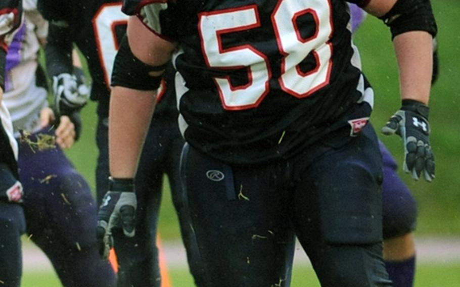 Bitburg lineman Adam Smith looks for somebody to block during the Barons' Division II title game victory over Mannheim on Nov. 6. Smith was named the first Stars and Stripes football player of the year.