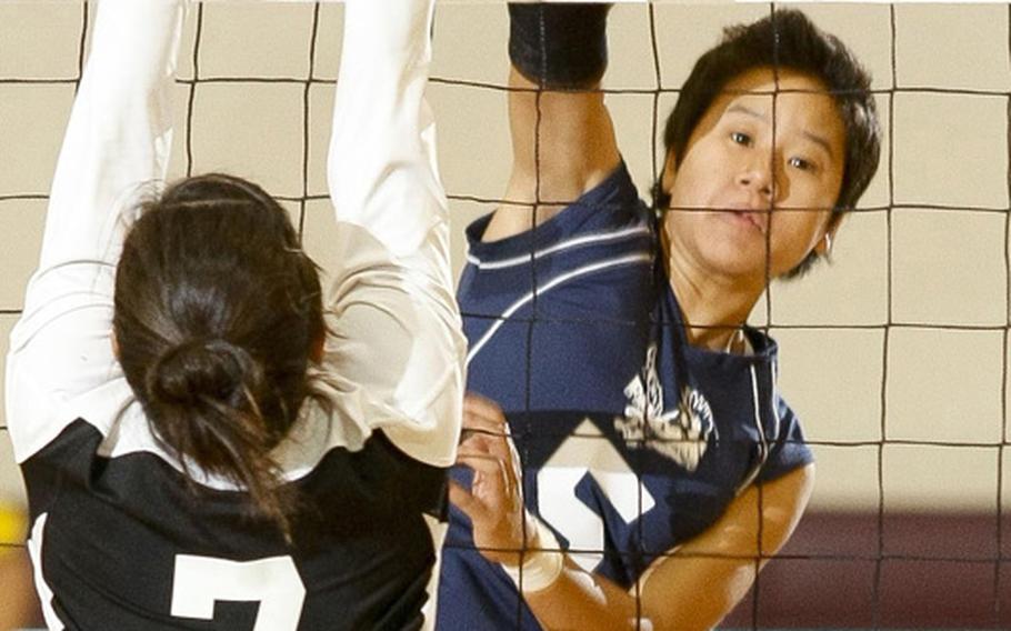 Seoul American senior outside hitter Liz Gleaves helpeed lead her Falcons to the first Far East Division I Tournament title in school history and the first for outgoing 31-year coach Denny Hilgar. She was the first player in school history to be named the tournament's MVP. Gleaves shares Stars and Stripes' Pacific high school girls volleyball Player of the Year honors with Kristina Bergman of Daegu American.