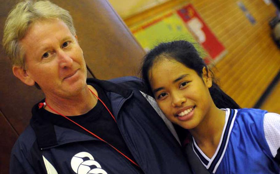 Yokota girls basketball coach Paul Ettl and his daughter and starting guard, junior Erika Ettl, are hoping the Panthers have a strong season.