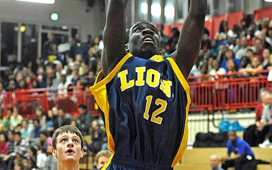 Heidelberg's Eugene Jones scores in last season's Division I championship game loss to Ramstein. The senior is hoping that this year the Lions can take the title - and he skipped football to polish his basketball skills to help them do it.