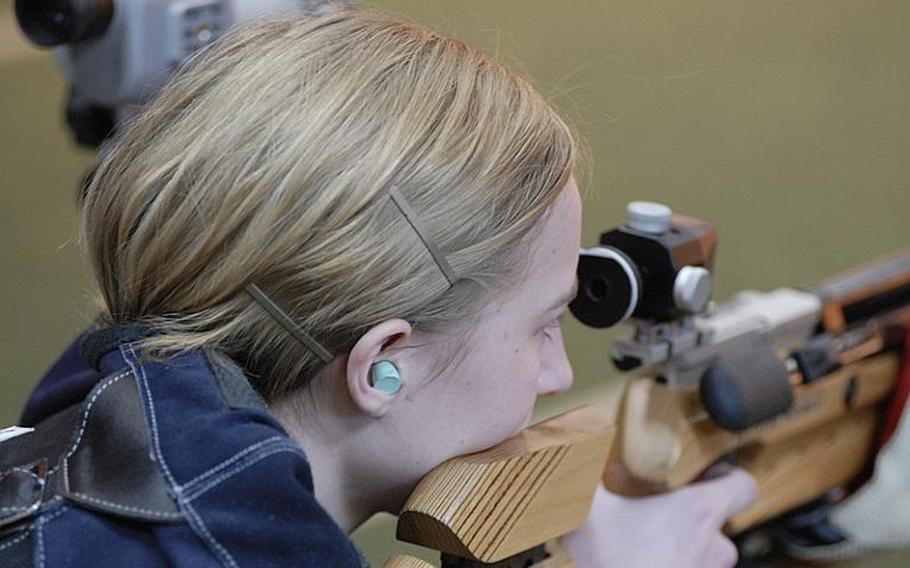 Patch senior Allison Carlson takes aim at the targets at Saturday's high school marksmanship match at Heidelberg High School.  The two-time defending champion Panthers finished first in the three-team compeition for the second straight week.