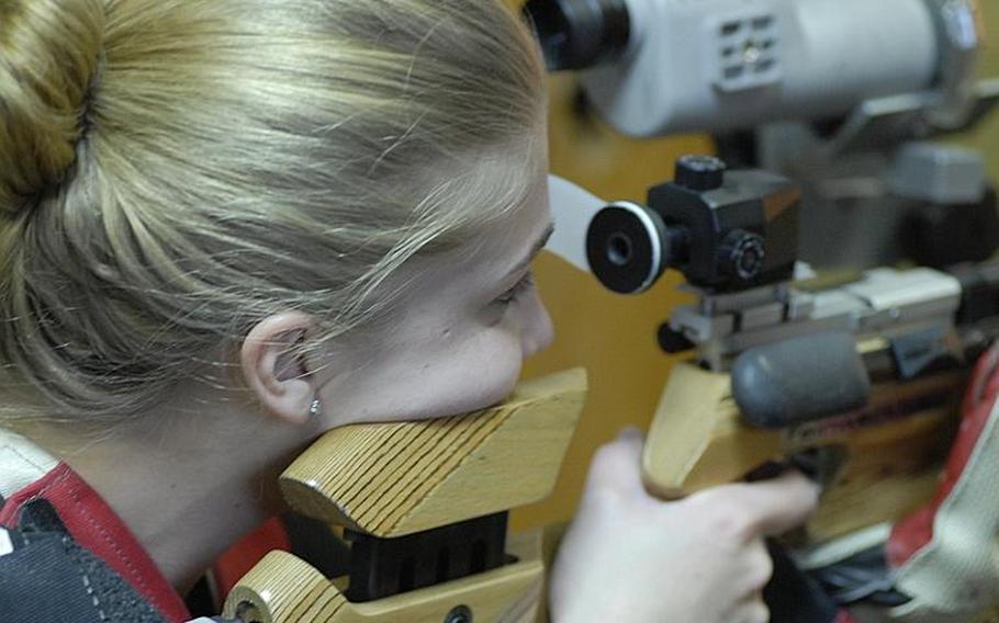 Patch junior Mercedes Romih takes aim at the targets at Saturday's high school marksmanship match at Heidelberg High School.  She finished fifth in individual scoring as two-time defending champ Patch outshot the competition.