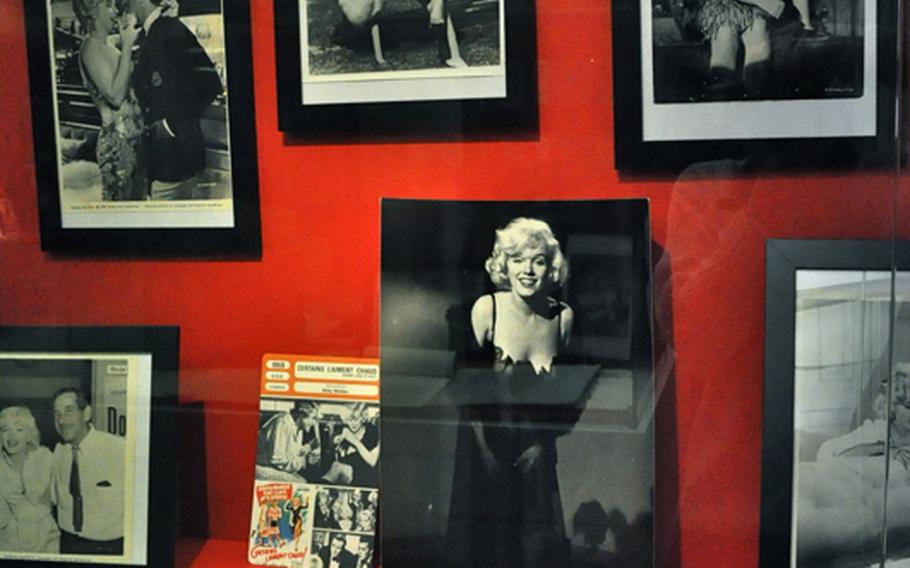 Production stills from some of Marilyn Monroe's films, including the comedy 'Some Like It Hot,' in which two struggling musicians, played by Tony Curtis and Jack Lemmon, are forced to dress as women to escape the mob.