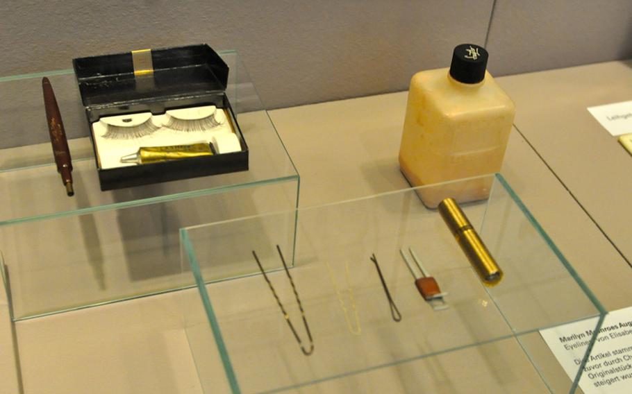 In this display are a rusted set of tweezers, a single tube of lipstick, eye shadow, fake eyelashes, and a box of  face powder. 'It still smells of roses and musk, like Norma Jean,'  Ted Stamfer, a Stuttgart collector who owns most of the memorabilia, told the German newspaper Bild. He was referring to her real name, Norma Jean Baker.