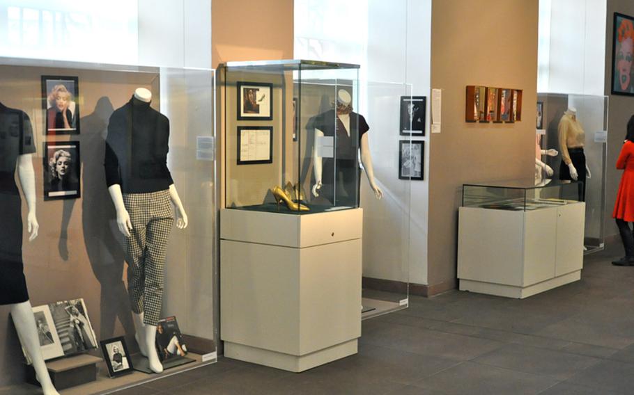 Several pieces of Marilyn Monroe's wardrobe are included in the exhibit. Some of the clothing is from her famous films, such as the golden Salvatore Ferragamo stilettos she wore in 'Bus Stop,' while others are plain sweaters, slacks and skirts she enjoyed wearing.