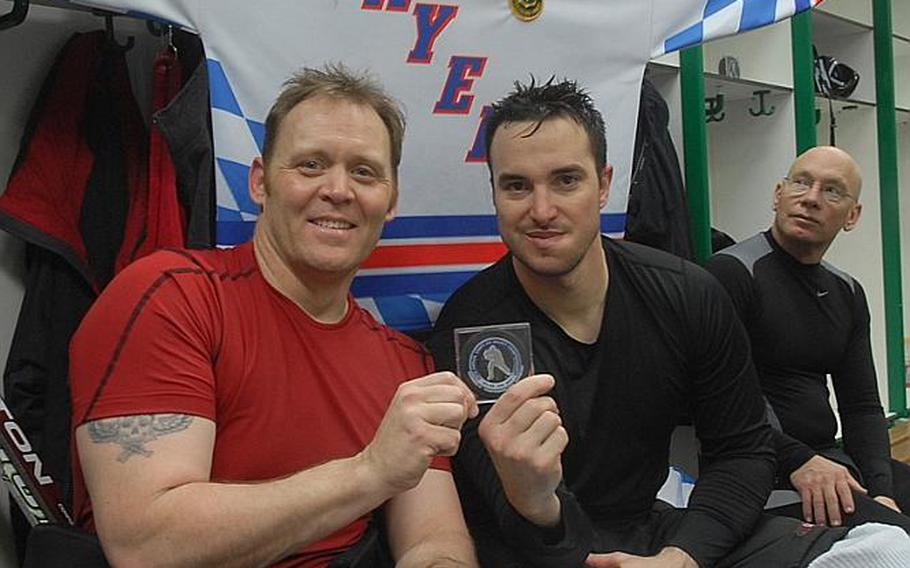 Mick Mineni, left, and  Matt Donofrio, both members of the 2nd Stryker Cavalry Regiment, took rest-and recuperation leave from Afghanistan to make the trip to Garmisch, Germany, to play in the  U.S. Forces Ice Hockey Championship tournament. The two helped lead the Bayern Rangers to a third-place finish.