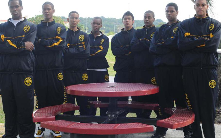 From left, junior Savon Woodie, sophomore Christopher Young, sophomore Josh Ward, sophomore Andre Chilton, junior Ray Josef, sophomore Shawn Broughton, junior Josh Dyer and sophomore Jaylen Street are eight players on the Kadena Panthers' varsity who should return for next season as well.