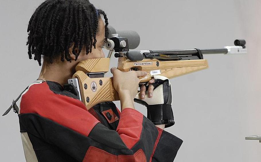 Hohenfels sophomore Keyera Howard takes aim in the standing position at Saturday's 2011 DODDS-Europe marksmanship championships at Baumholder, Germany.  Hohenfels captured the team title with 1,374 points.