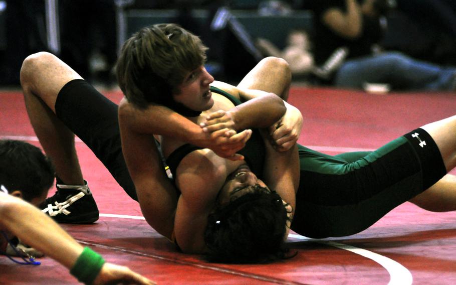Naples' Conor Skelton pins Miguel Rodriguez of Vicenza in a 140-pound match Saturday at the DODDS Europe Southern Region wrestling tournament at Aviano Air Base, Italy.