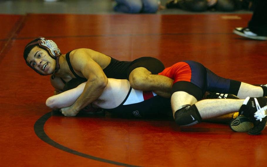 Baumholder's Adrian Julien controls Lakenheath wrestler Tyler Lloyd during the final for the 119-pound weight class at the DODDS-Europe Northern Sectionals. Lloyd defeated Julien for first place at the sectionals. Last season, Julien defeated Lloyd in the European championship match in the 112-pound class.