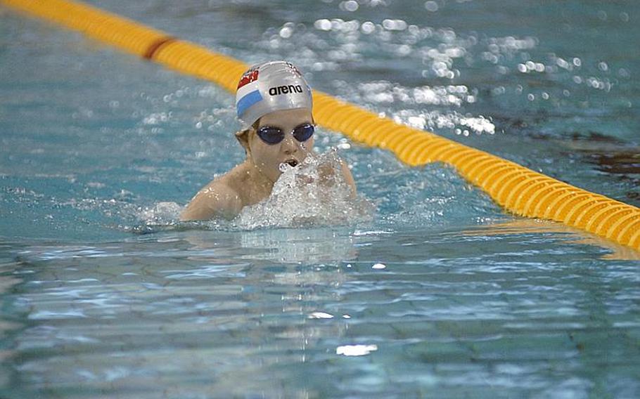 Charlie Pacher,8, with the Wiesbaden Wahoos competes in the breaststroke portion of the 200-meter individual medley during Sunday's final swims of  the 2011 European Forces Swim League Championships at Eindoven, Netherlands.