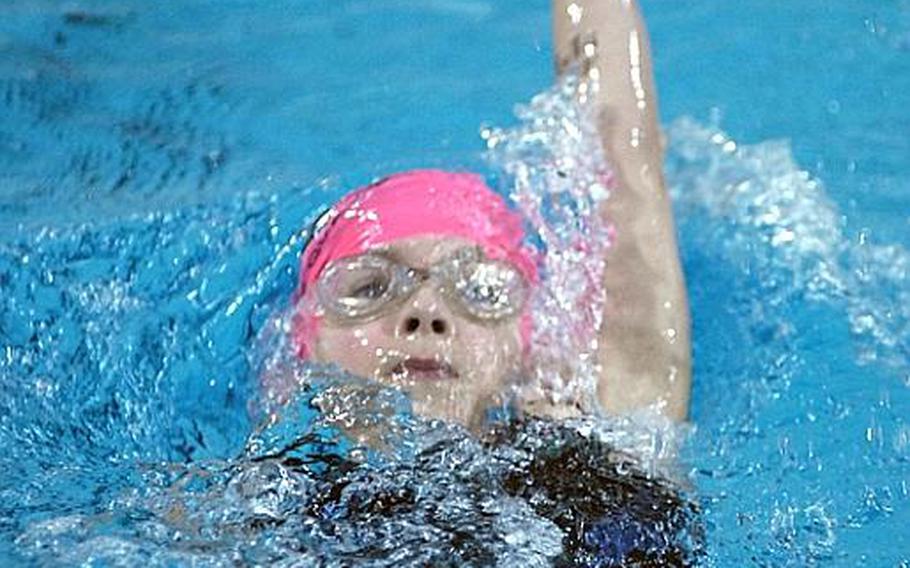 Mattison Boveri,9, with the Naples Tiger Sharks does the backstroke during the 200-meter individual medley at Sunday's final swims of  the 2011 European Forces Swim League Championships at Eindoven, Netherlands.