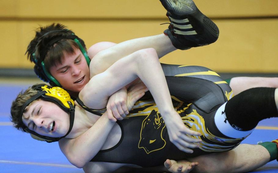 SHAPE's Matthew Lengyel, top, defeated Patch's Justin LeMay in their second-round 125-pound match in the first day of action at the DODDS Europe wrestling championships in Wiesbaden.