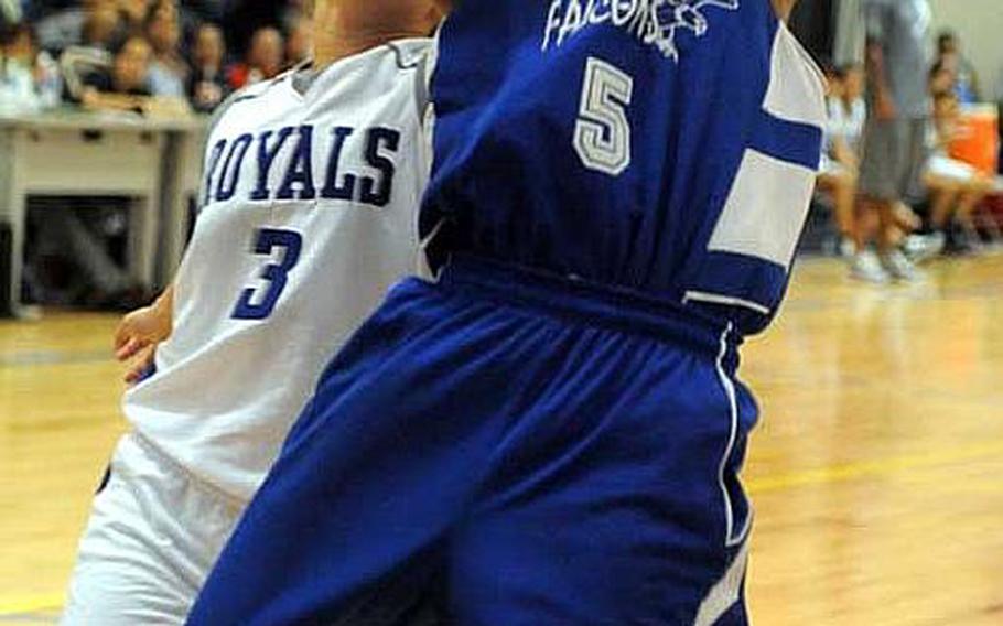 Liz Gleaves (5) of Seoul American drives past Notre Dame&#39;s Mariana Crisostomo during Tuesday&#39;s pool-play game in the Far East High School Girls Division I Basketball Tournament at Charles King Fitness & Sports Center, Naval Base Guam. Seoul American won 81-51.