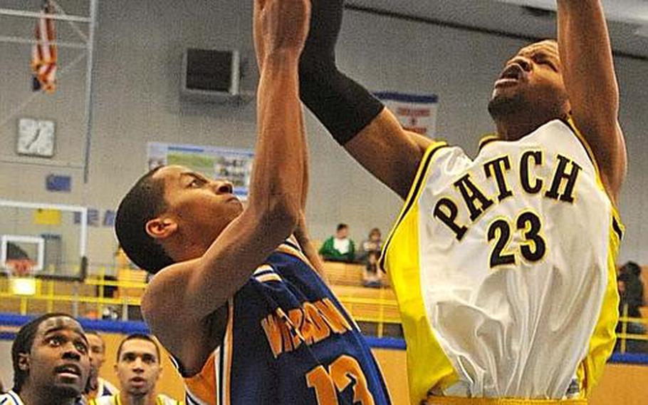 Patch's Shaquille Hunter aims for the basket against Wiesbaden's Victor Strange in a Division I game at the DODDS Europe basketball championships in Heidelberg, on Tuesday. Patch beat the Warriors, 66-59.