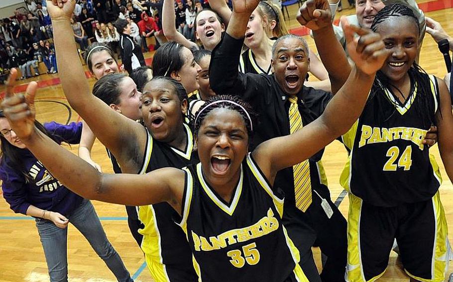 The Patch Lady Panthers celebrate their 64-52 Division I title after beating the Visleck Lady Cougars on Saturday night.