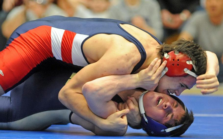 Adam Carroll of Lakenheath, top, beat Heidelberg's Daniel LeJeune for the 145-pound title. Carroll, who completed his second straight undefeated, championship season with the win, was selected as Stars and Stripes wrestler of the year in DODDS Europe.