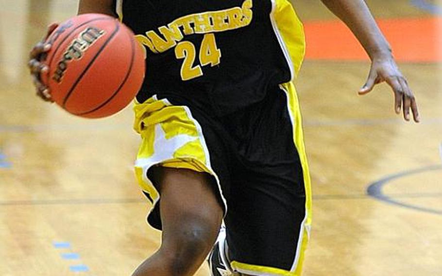 Patch's Janelle  Loney drives the ball up court in the Division I final against Vilseck in February.