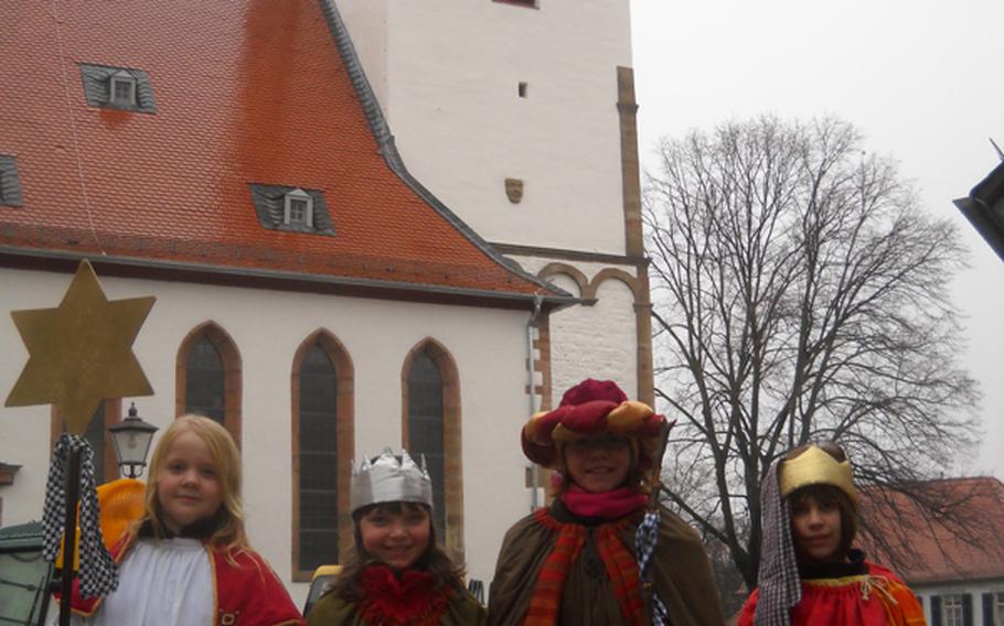 At the start of a new year, Star Singers offered a song in front of St. Peter’s church. It’s typical to see youngsters raising money for charitable causes around the Three Kings holiday.