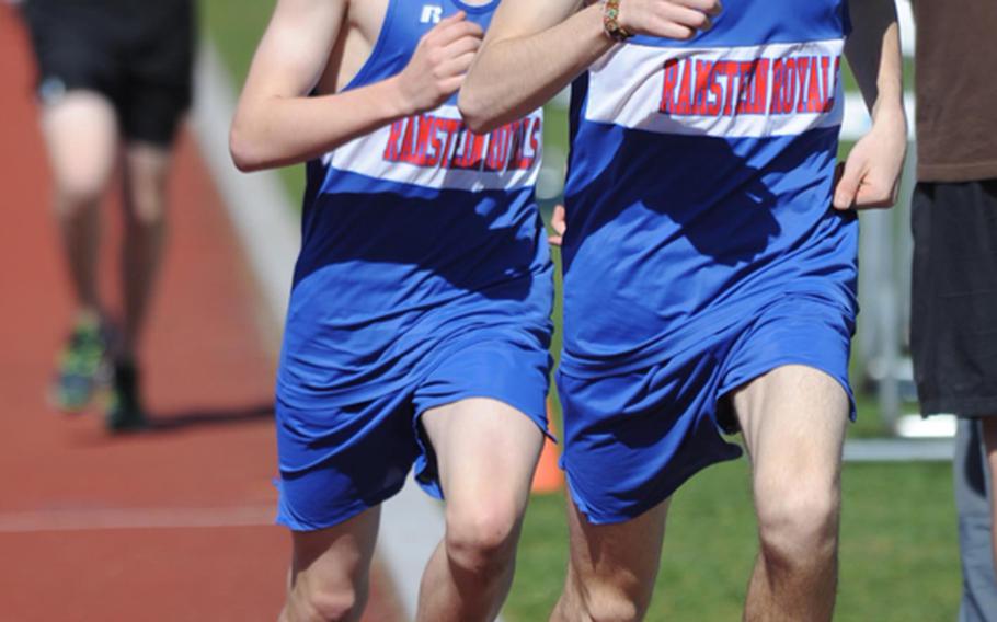 Ramstein's Carl Lewenhaupt, right, leads teammate Jack Scranton into the final lap of the boys 1,500-meter race at Ramstein on Saturday.  Scranton passed Lewenhaupt to win the race in 4 minutes, 25.38 seconds. Lewenhaupt posted a 4:25.84. Complete results from the meet were not available Saturday evening.