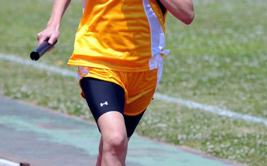 Freshman Ana Hernandez of Kadena runs the third leg of the girls 1,600 relay during Saturday's Okinawa Activities Council weekly quadrangular track and field meet at Kubasaki High School, Okinawa. Hernandez and Kadena A won in 4 minutes, 29.68 seconds.