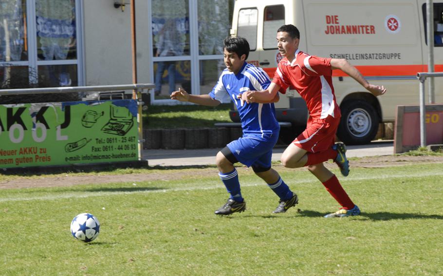 Wiesbaden senior Alexander Hernandez and Kaiserslautern junior David Valverdaye-Vargos race to the ball during their match at the Stadion In der Witz in Mainz-Kastel, Germany.  The game ended in a 1-1 draw on Saturday.