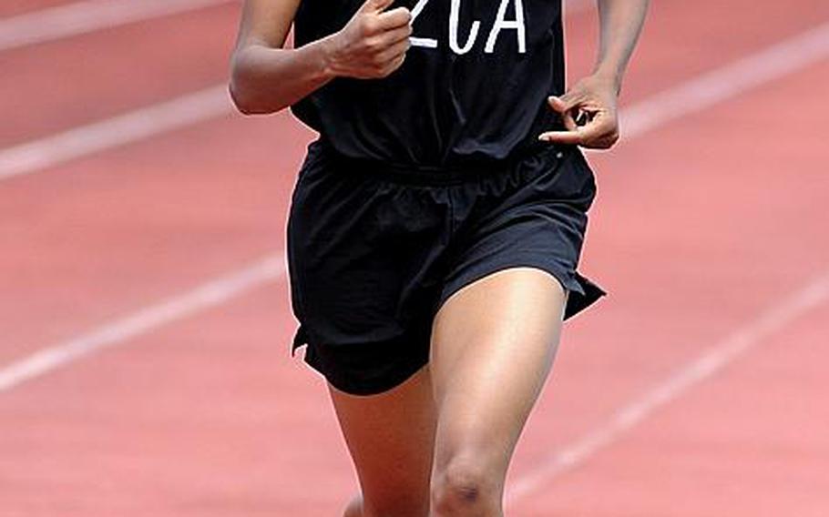 Zion Christian Academy's Teauna Baker races for the finish line in girls the 800-meter final during Saturday's Okinawa Relays at Kubasaki High School, Okinawa. Baker remained unbeaten in the 800 with a time of 2 minutes, 38.71 seconds.