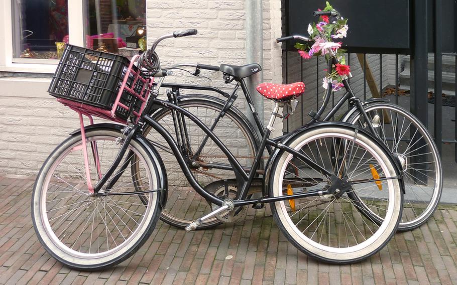 Two bicycles parked outside a ?s Hertogenbosch house make a typical Dutch still life.